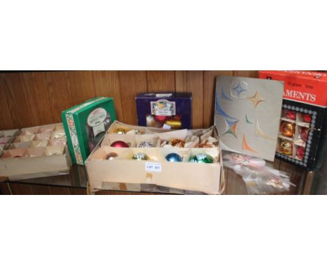 A shelf of vintage and retro Christmas decorations