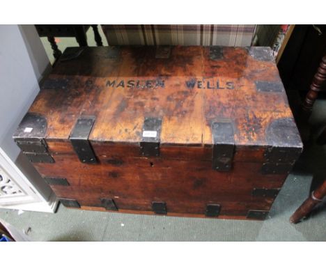A substantial wooden metal bound travel trunk