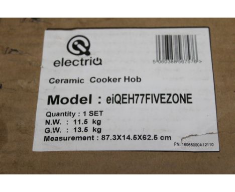 A boxed Electric ceramic cooker hob eiQEH77 5ZONE