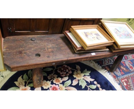 A pine low rustic style bench, on four block legs&nbsp;