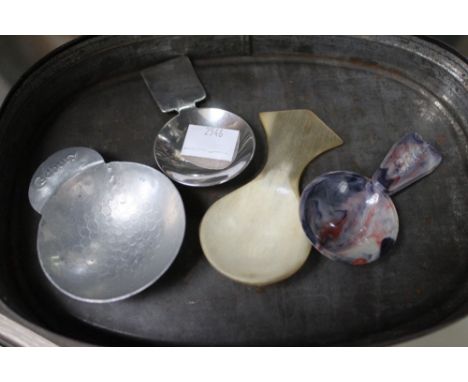 Bruce Russell, silver caddy spoon, Guernsey mark 1990's, together with a horn example, a Bakelite and and aluminium one inscr