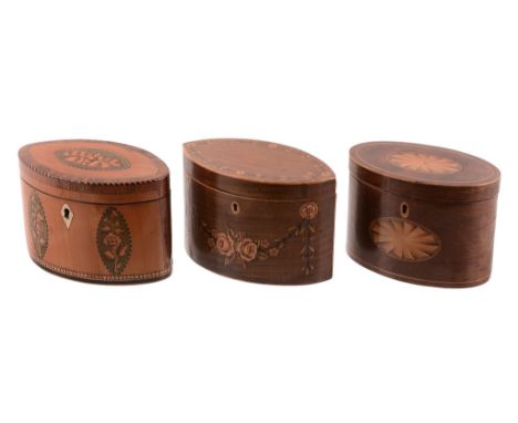  A George III harewood and marquetry tea caddy,   late 18th century, of navette section, the hinged cover with a border of fl