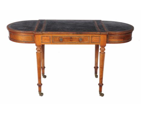  A Regency rosewood and brass bead inlaid writing table  , circa 1815, the tooled gilt leather inset top with central slide w