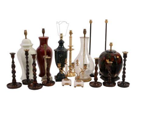 A selection of modern table lamps, including a turned wood, metal, pottery and glass examples, and a brass standard lamp with