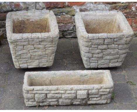 Pair of stone wall effect planters and a trough