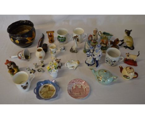 Various ceramics including cat figures, cups, small teapot etc