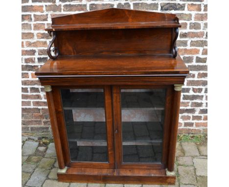 Victorian rosewood chiffonier with glass panel doors flanked by pillars, with pediment over and shelf on scroll supports