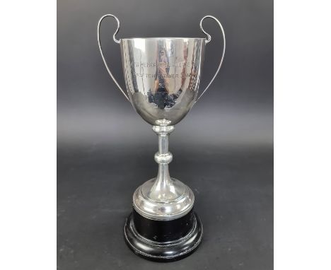 A large silver trophy cup, by&nbsp;James Fenton &amp; Co, Birmingham 1927, height to handle 33.5cm excluding socle, 500g. 