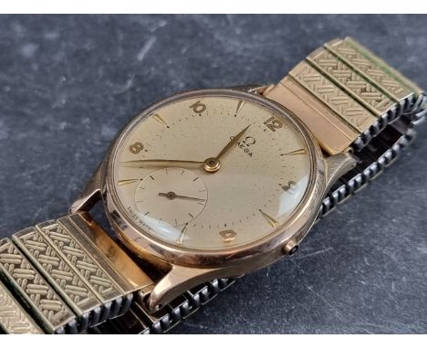 A circa 1949 Omega 'Jumbo' 9ct gold manual wind wristwatch, 33mm, Ref. 11608687, Cal. 265, on later expanding bracelet. 