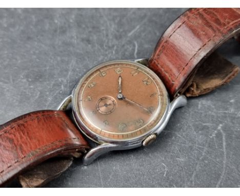 A Swiss WWI Art Deco style stainless steel manual wind wristwatch, 37mm, Ref. 78434, on brown leather strap. 