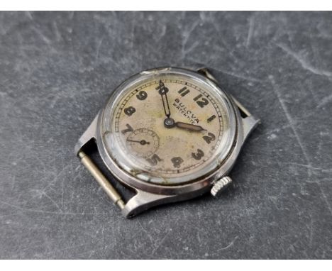 A 1930s Bulova stainless steel manual wind wristwatch, 29mm, (lacking strap). 