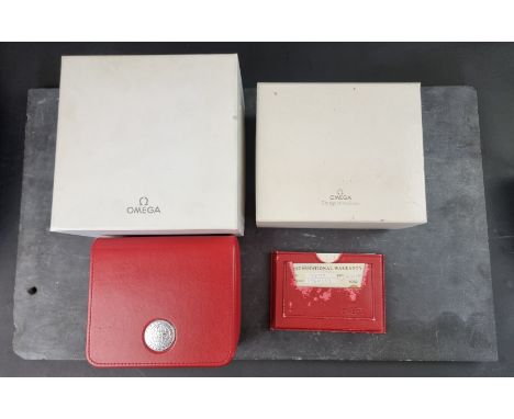 A Omega wristwatch box; with outer card box;&nbsp;chronometer guarantee booklet; and other papers; together with another simi