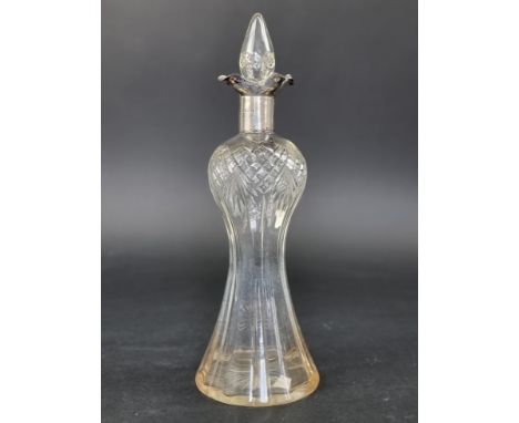 A silver mounted cut glass decanter and stopper, by&nbsp;William Hutton &amp; Sons Ltd, Birmingham 1924, 34.5cm high. 