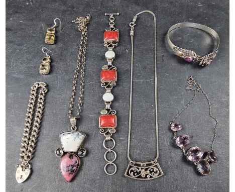 A silver bracelet, having padlock clasp; together with three various white metal pendant necklaces; a .925 bracelet, set colo