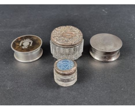 A silver and tortoiseshell box, by&nbsp;C &amp; A, London 1918; together with another engine turned silver box; and two lidde