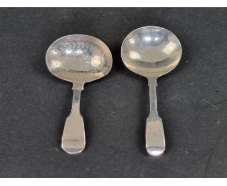 A George IV silver caddy spoon, by&nbsp;Clement Cheese, London 1827; together with another silver caddy spoon, 23.4g. (2) 