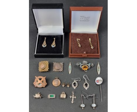 A pair of 9ct gold blue topaz earrings; together with another pair of 9ct gold blue gem set earrings; a pair of opal ear stud