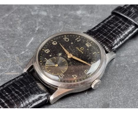 A circa 1948 Omega black dial stainless steel manual wind wristwatch, 33mm, Ref. 11583155, Cal. 265, on replacement black lea
