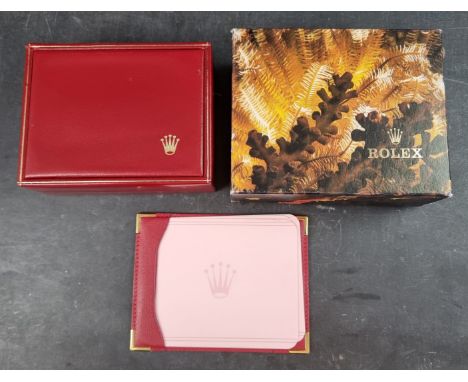 A vintage Rolex wristwatch box, Ref. 14.00.02, with outer card box; 'Oyster' chronometer guarantee booklet; and a leather not