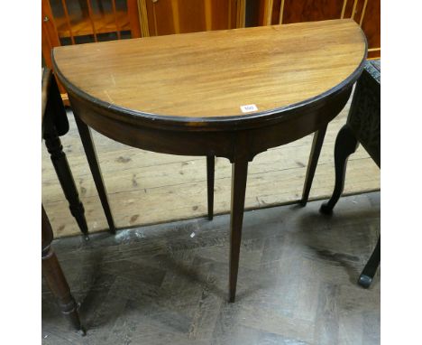 A 3' D shaped Victorian mahogany folding top card table 