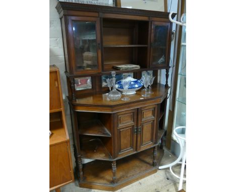 A 4'6 Edwardian walnut shaped front sideboard with glazed and shelf cabinet back