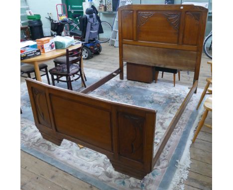 A 4'6 oak French bed surround