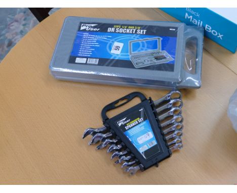 A new 8 piece combination spanner  set and a new 1/4" drive and 3/8" drive socket set