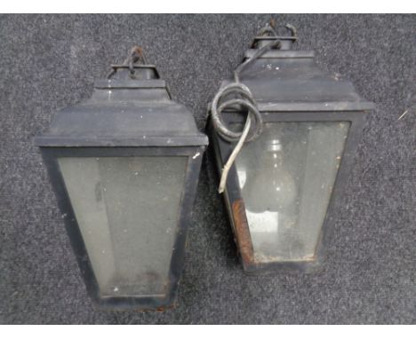 Two cast iron outdoor hanging lantern lights 