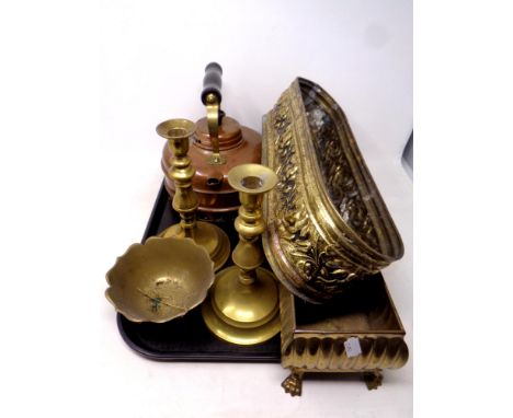 A tray containing metal wares to include antique brass candlesticks, bowl, two brass troughs and a copper kettle 