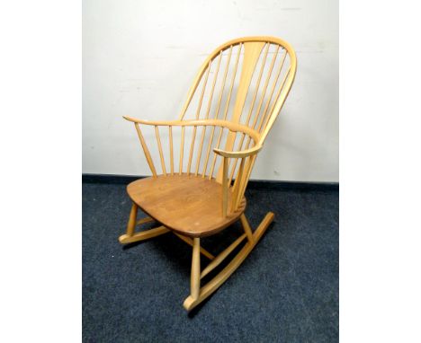 An Ercol elm rocking chair, width 63 cm  