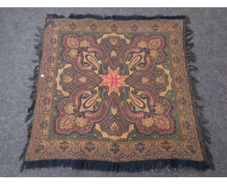 A fringed tapestry prayer mat  