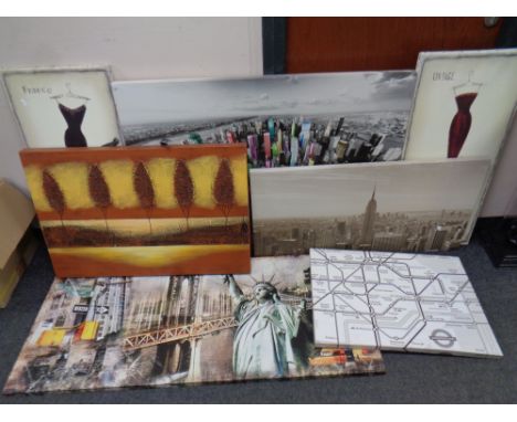 Seven assorted wall canvas depicting scenes of New York, London Underground map etc, together with a piece of metal wall art 