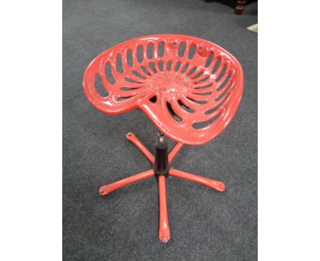A Verite cast iron tractor seat stool 