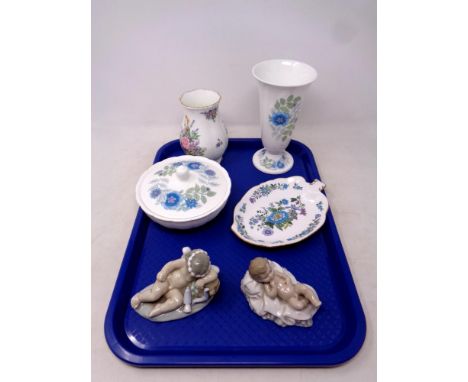 A tray containing assorted ceramics to include two Nao figures, baby and cherub, Wedgwood bone china vase and lidded trinket 