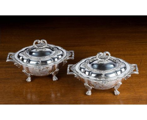 A PAIR OF GEORGE IV SILVER SHAPED OVAL SAUCE TUREENS AND COVERSROBERT HENNELL, LONDON 1817With foliate loop handles to the og