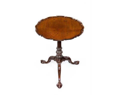 A GEORGE III MAHOGANY TRIPOD TABLE CIRCA 1760 The top with 'pie crust' moulded edge67cm high, the top 55cm diameter Provenanc
