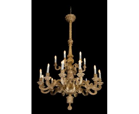 A LARGE AND IMPRESSIVE GILTWOOD 18 LIGHT CHANDELIER PROBABLY LATE 19TH/EARLY 20TH CENTURY, IN THE FRENCH EARLY 18TH CENTURY M