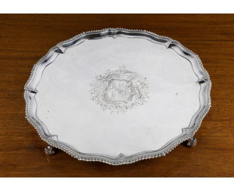 A GEORGE III SILVER SHAPED CIRCULAR SALVERRICHARD RUGG, LONDON 1767With a shaped gadrooned border, engraved with an armorial 