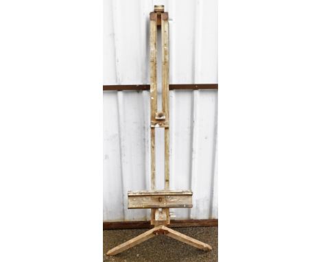An artist's easel, used by Terry Shelbourne, evidence of woodworm, 185cm high, approx 55cm wide. 