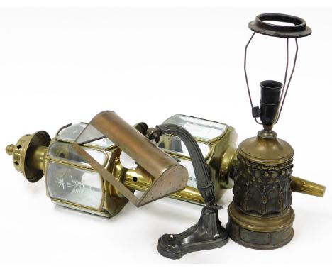 A group of lamps and lights, to include an arched desk lamp, a brass based table lamp, and a pair of converted railway lamps,