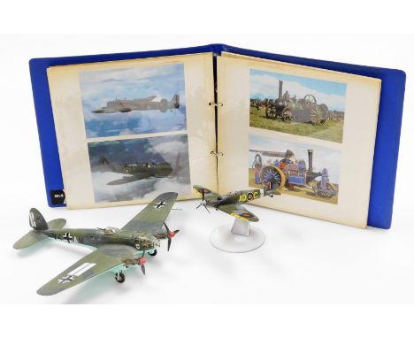 Two Corgi aviation models, to include the Heinkel Heiii, the Corgi Spitfire, stand wheels and aviation photographs. (3)