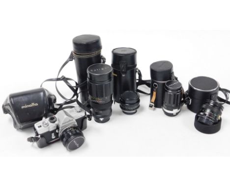 A group of camera lenses and cameras, to include a Miranda 1-3.5 lens, a Minolta 1-2 lens, a Vivitar 55mm lens, a Soligor Tel