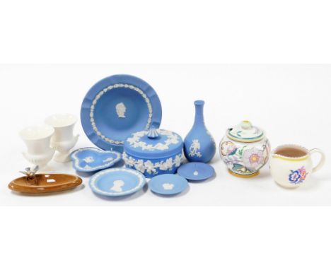 A group of Wedgwood and other trinket items, to include Wedgwood trinket jars, bud vases, Poole Pottery, Wedgwood urns, Wade 