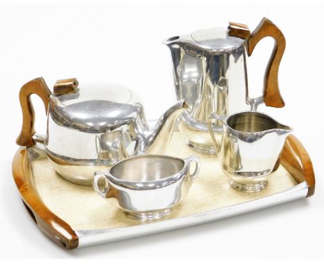 A Piquot ware four piece tea service, comprising coffee pot, milk jug, sugar bowl, teapot and tray.