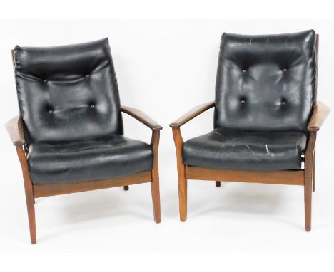 A pair of Danish type rosewood and leatherette armchairs, the two cushioned black faux leather button seats, on a rosewood fr