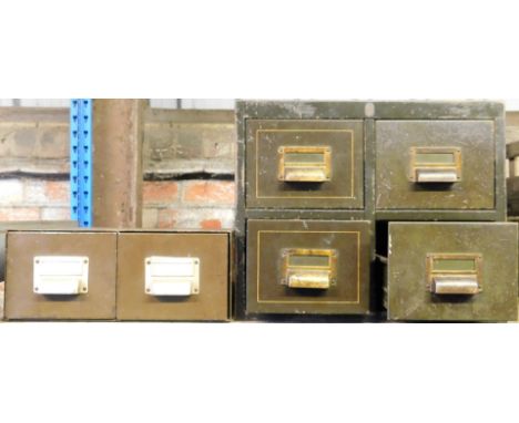 Various metal filing trays and tools, to include a bank of four metal filing drawers and a similar bank of two drawers. (2)