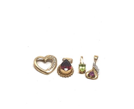 4 x 9ct gold gemstone pendants inc. diamond, ruby, garnet &amp; peridot (3.4g) 