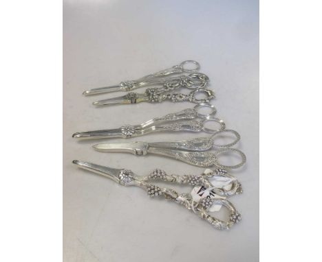 Five pairs of Victorian silver grape scissors 19.5ozt gross (5)