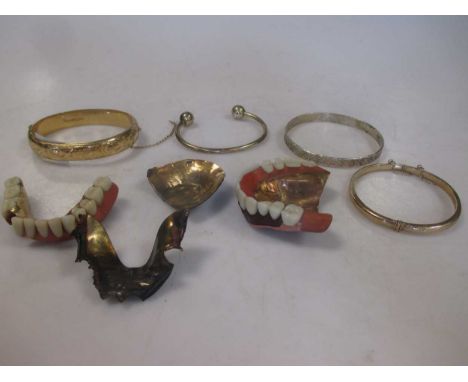 A 9ct gold bangle 7.8g, together with a quantity of dental gold estimated at 25g and three costume bangles (8)