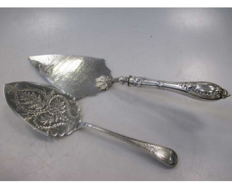 Two Victorian silver serving trowels, one with presentation engraving and filled handle, 10.5ozt gross (2)